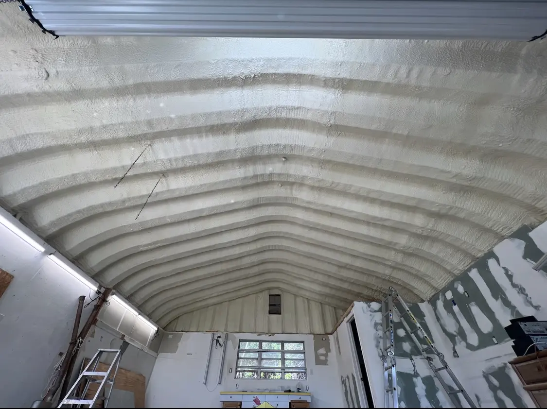 Spray polyurethane foam applied to the underside of a metal roof deck in Sevierville